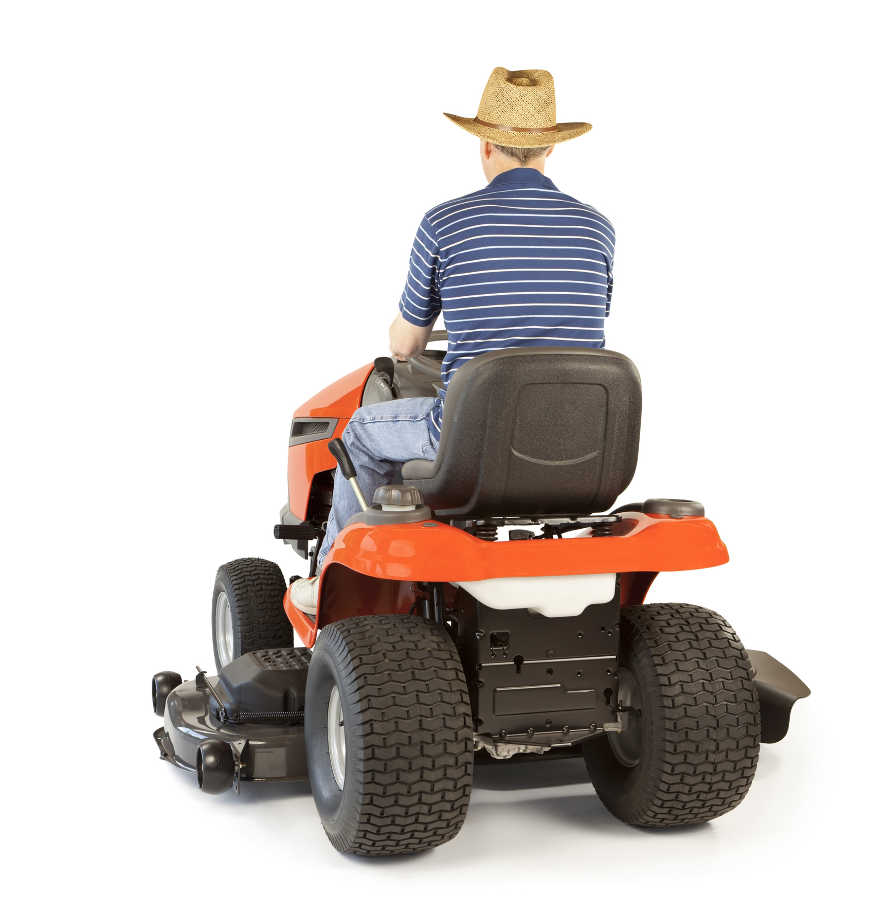 Man operating a riding mower