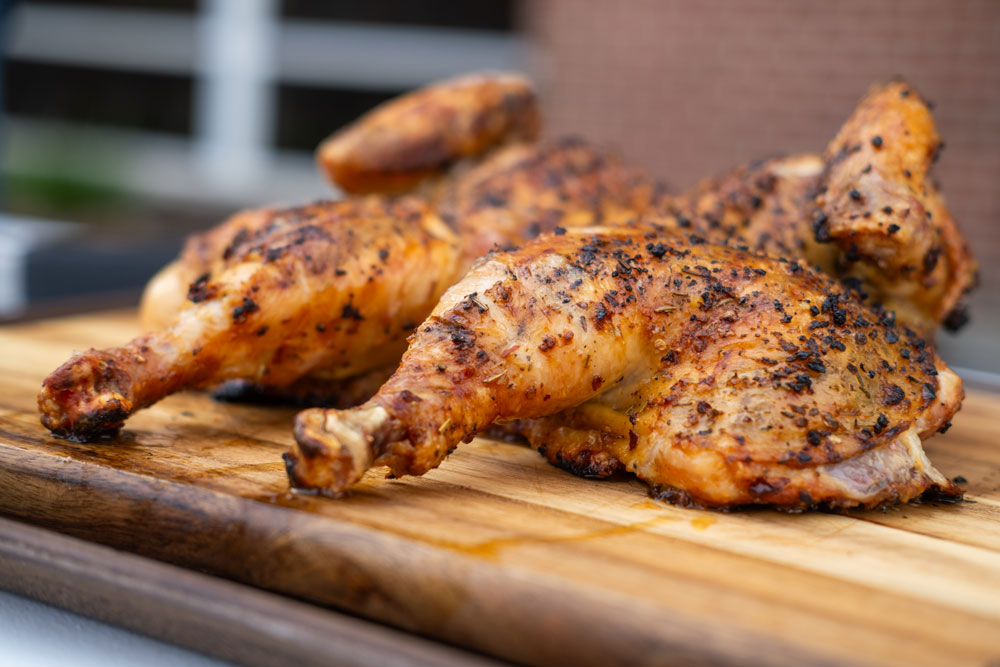 The grilled chicken is well seasoned and appears perfectly cooked.