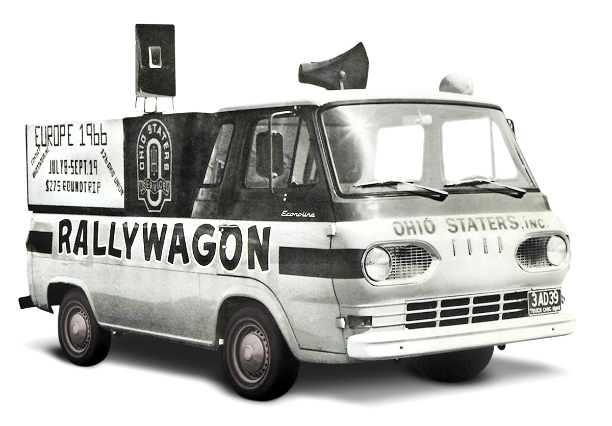 Van with signs painted on sides and loud speakers on top