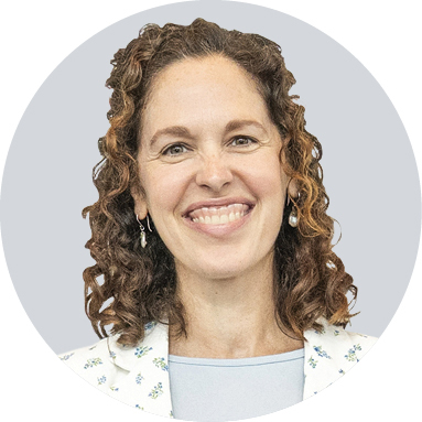 Danielle Schoon smiles for a portrait.