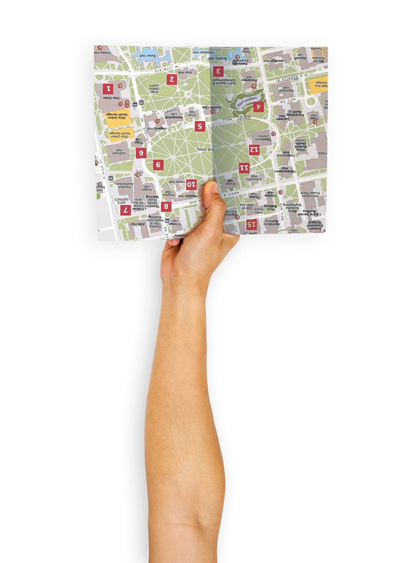 A hand holds a map of Ohio State's main campus upside down
