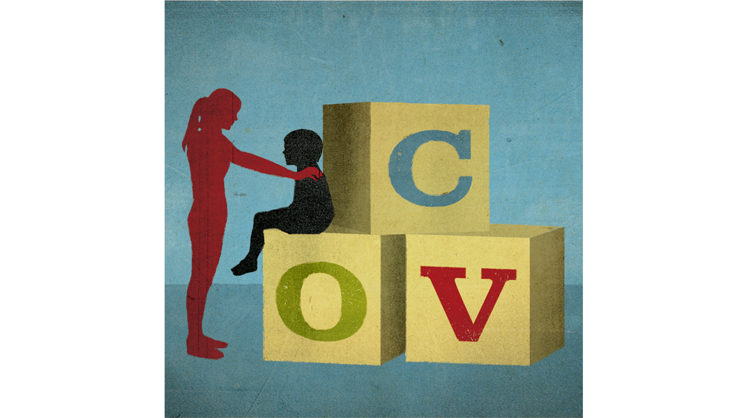 A parent counsels her child seated before her
