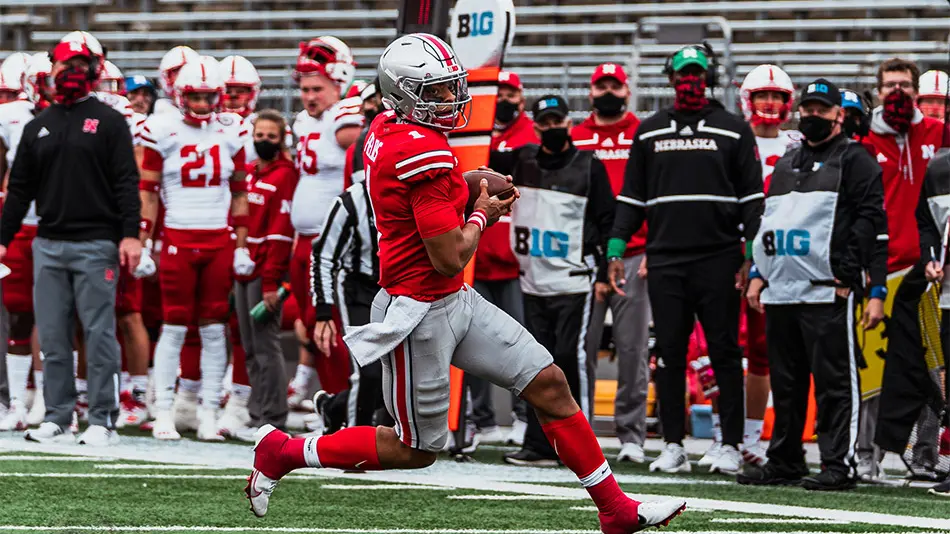 Justin Fields running the football during a game against Nebraska.