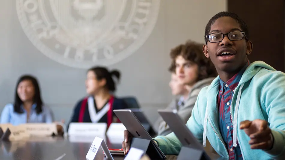 students with ipads in a classroom
