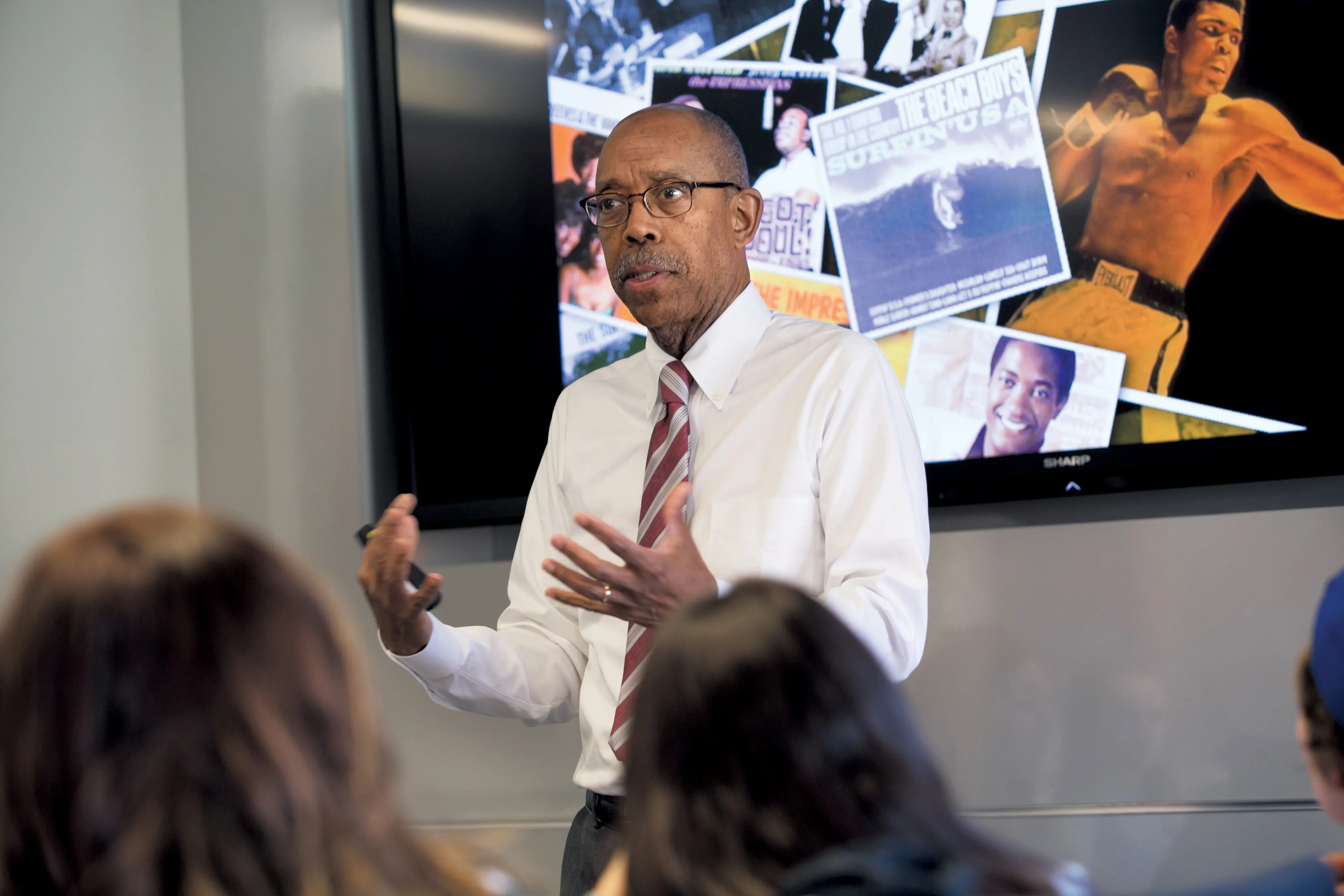President Drake presenting to students