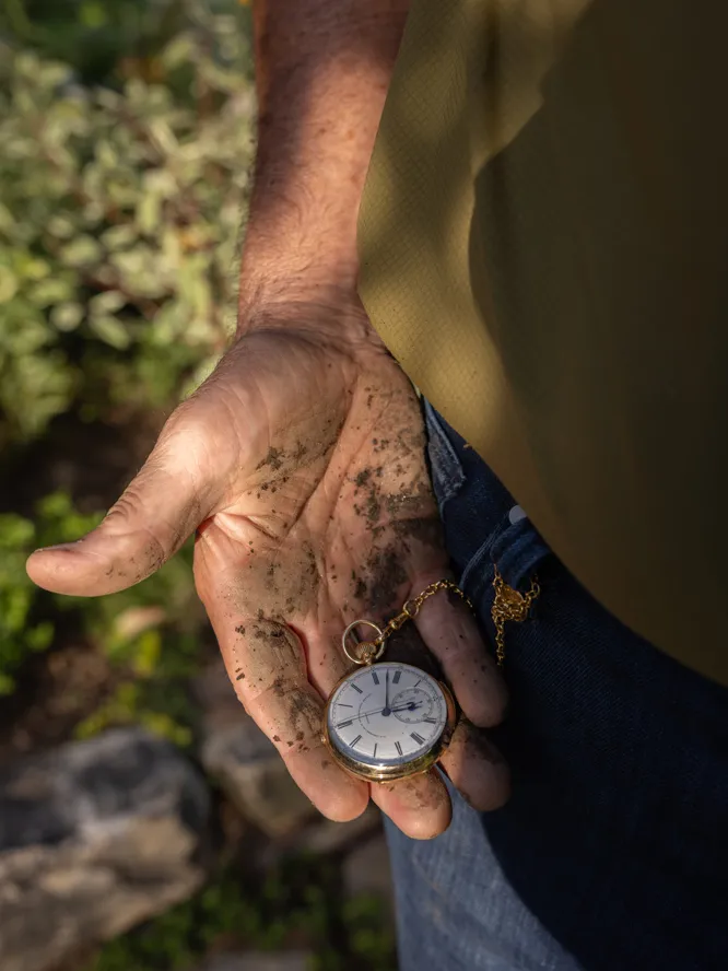 Hutchison pulls his pocket watch from his pocket. It is a little after 3 o'clock