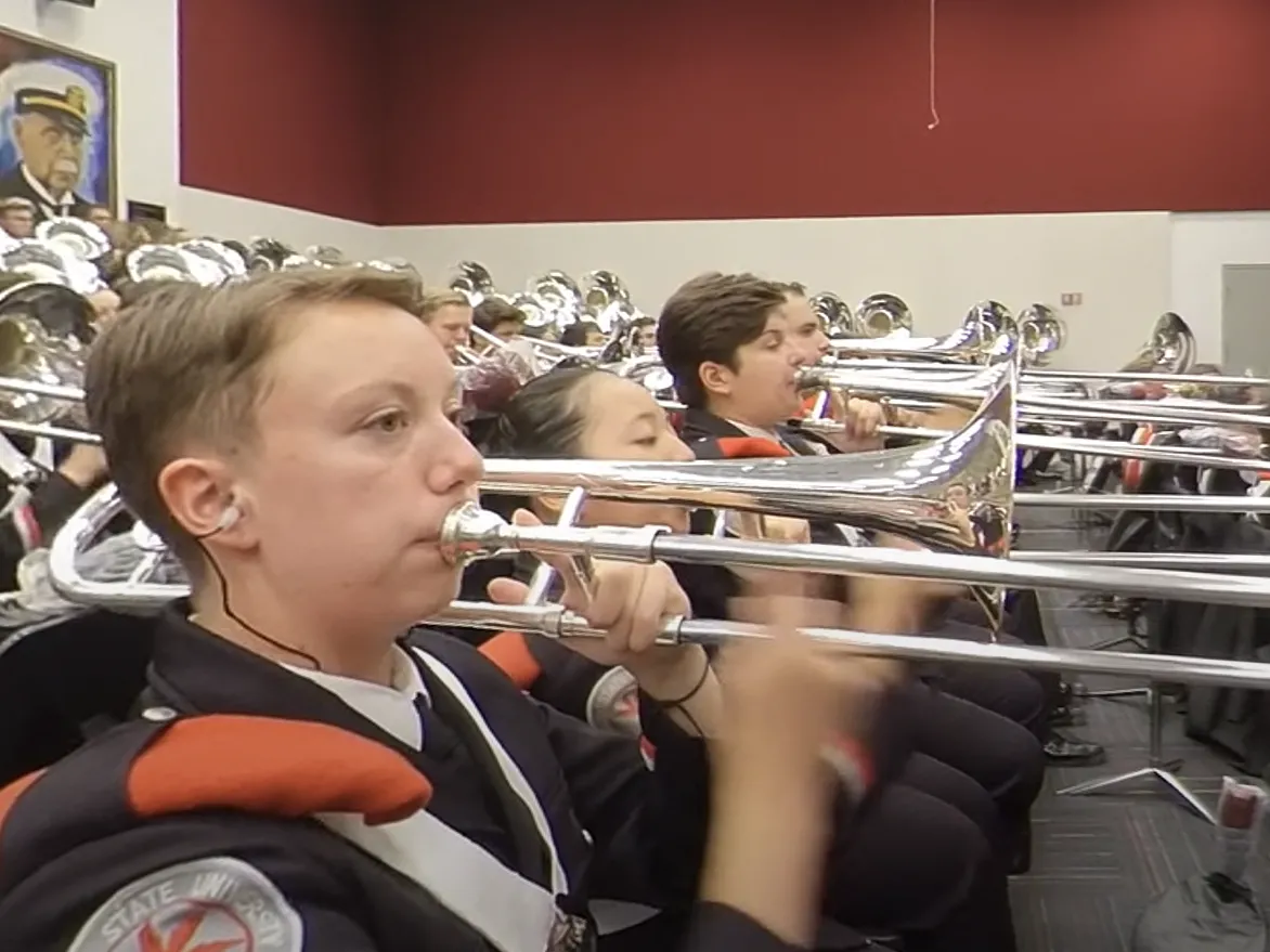 Ohio State University Marching Band as it practices “Buckeye Battle Cry” in the Ohio Stadium Rehearsal Hall.