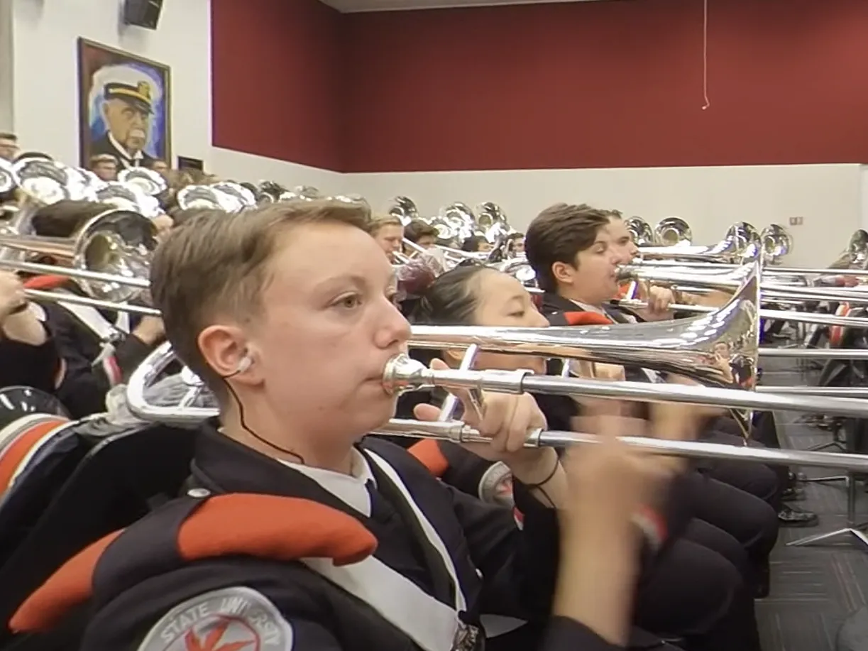 Ohio State University Marching Band as it practices “Buckeye Battle Cry” in the Ohio Stadium Rehearsal Hall.