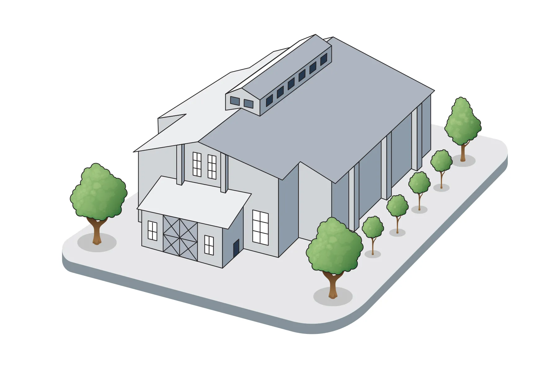 A gray building has a barn like shape with pitched roof
