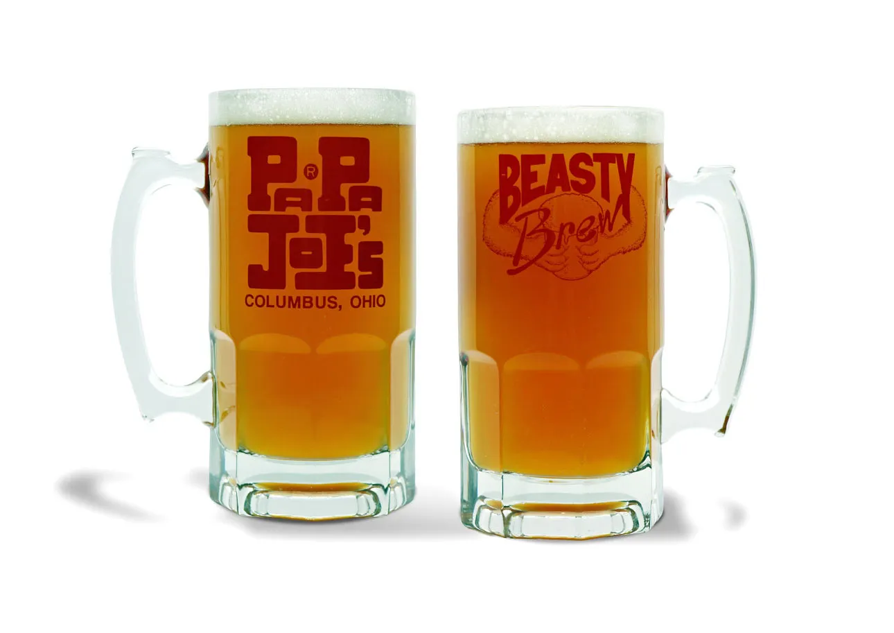 Two glass mugs filled with beer says Papa Joe's on one side and Beasty Brew on the other.