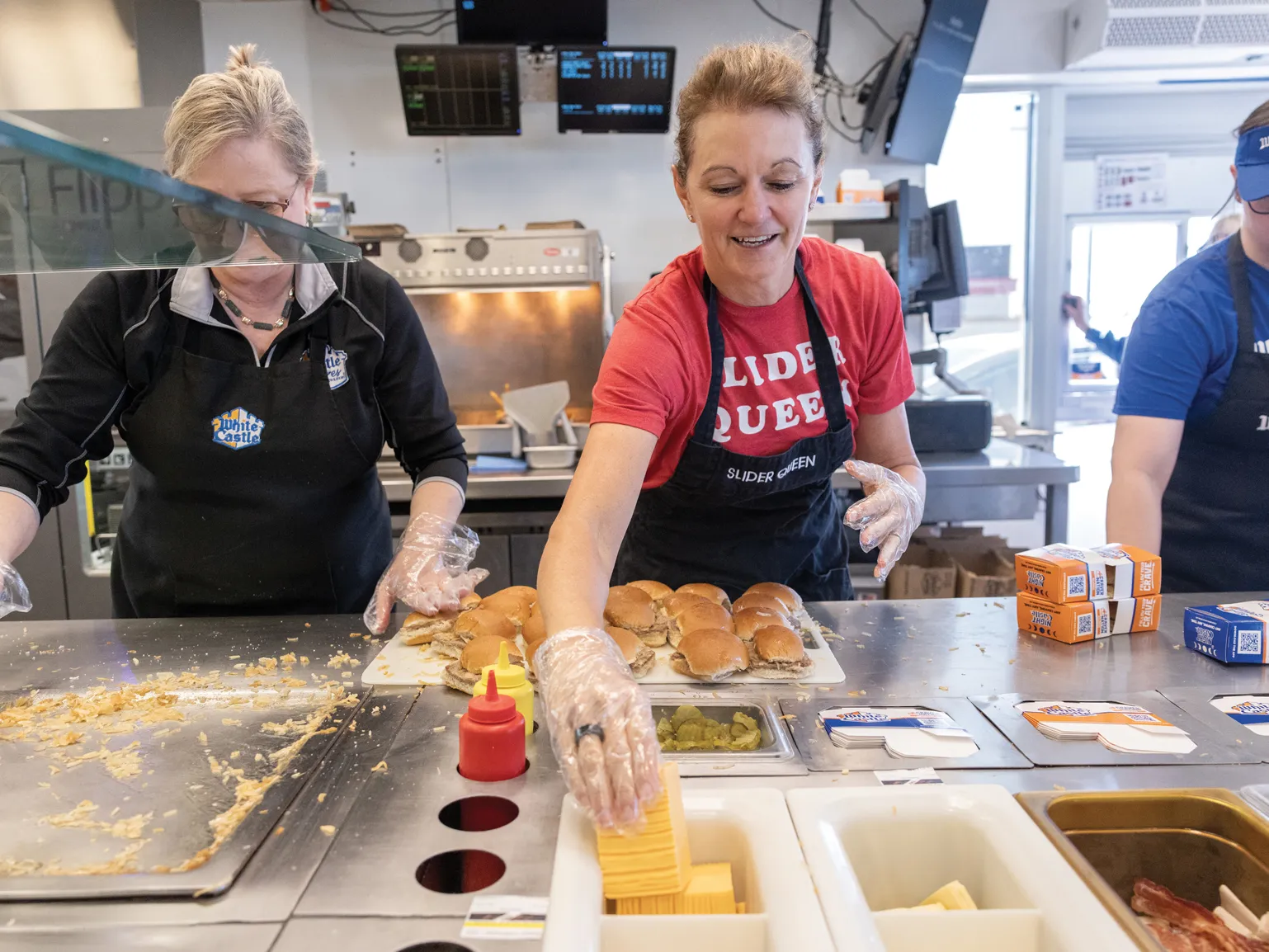 Lisa Ingram puts together rows of White Castle's famous sliders